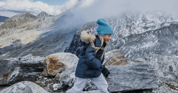 Kid playing in wilderness