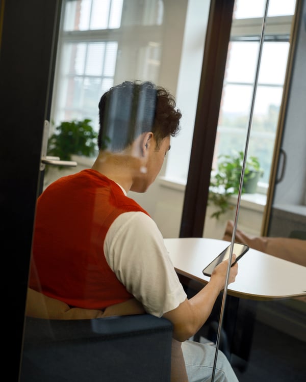Vincit developers providing custom software solutions in Phoenix Employee in Conference Room