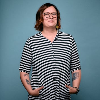 Hanna Hietamäki profile picture, black and white striped shirt with blue background