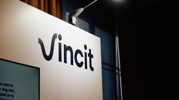 Vincit logo on a white wall