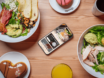 Arnolds mobile application with food items around it representing Arnolds' products