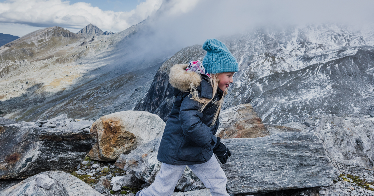 Kid playing in wilderness